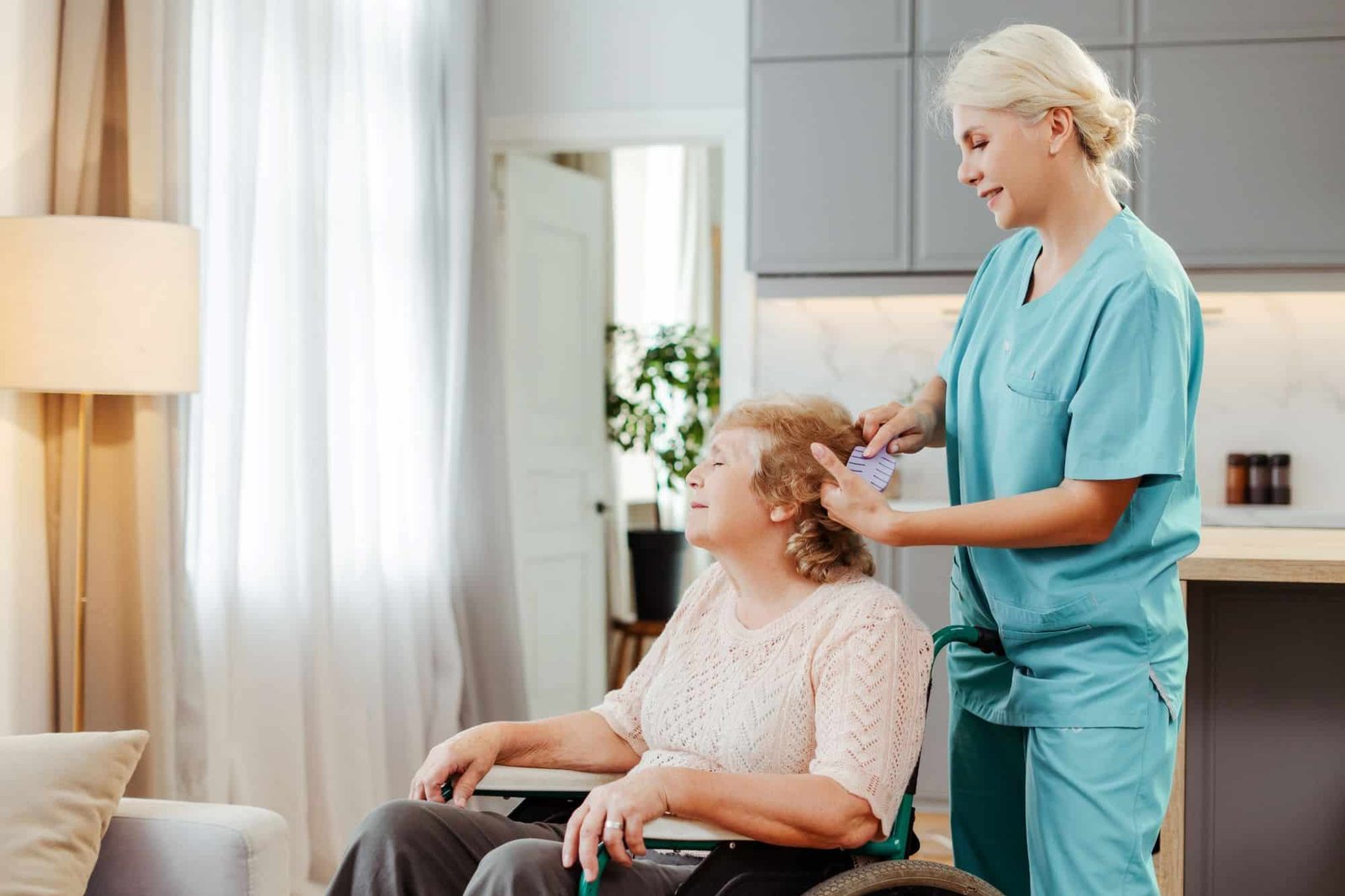 Home Healthcare Blog - Nurse brushing elderly woman's hair